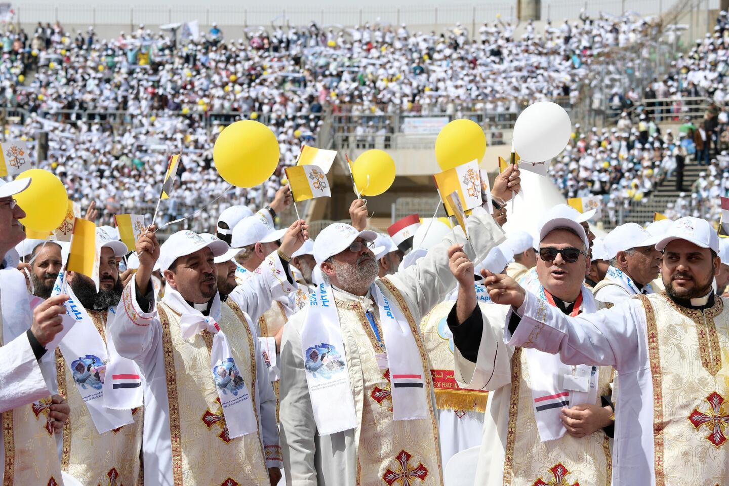 A photo from the Vatican press office shows Egyptian priests during a Mass celebrated by Pope Francis at a Cairo stadium.
