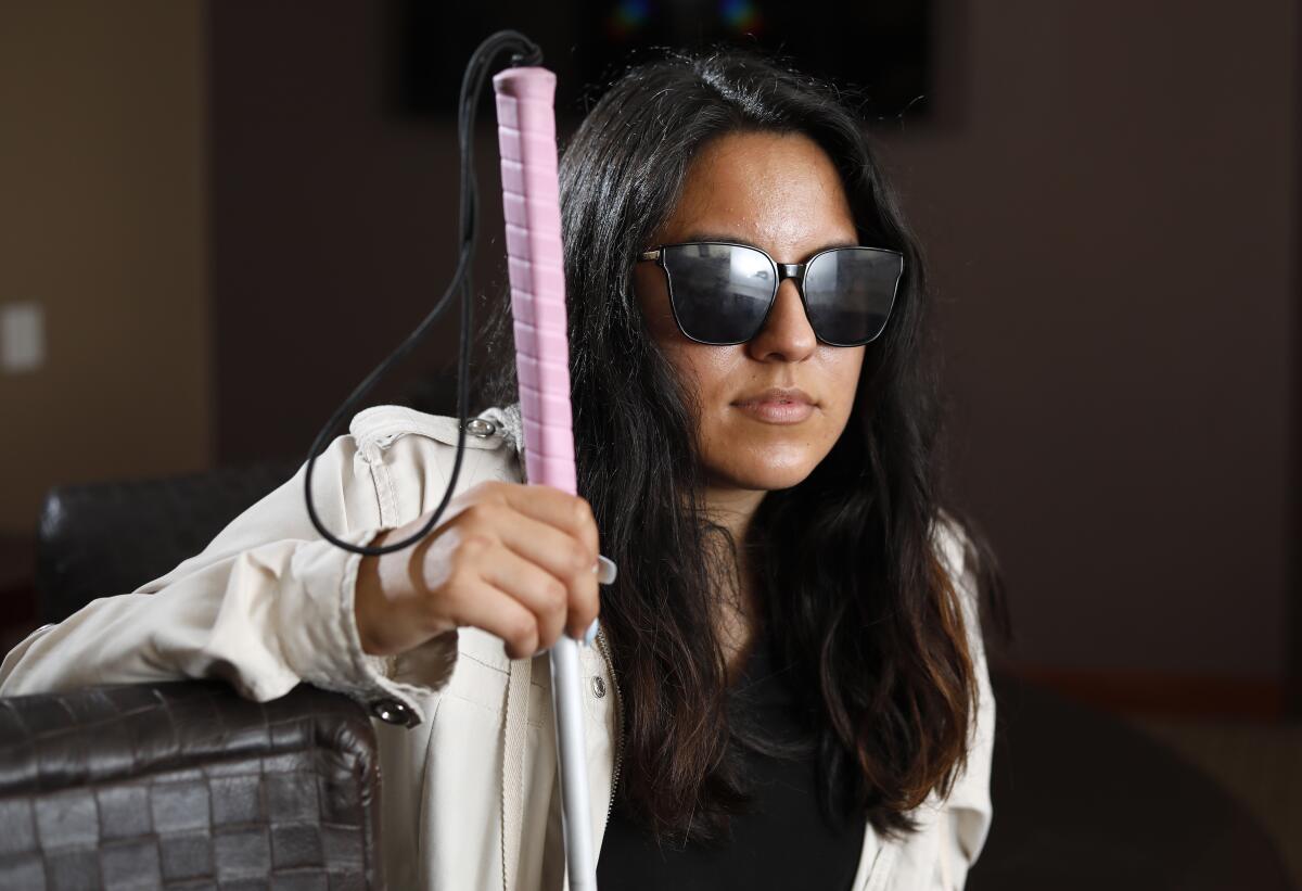 Tanya Suarez, who is completely blind, is shown here at the Braille Institute in La Jolla after taking a reading lesson on March 10, 2020. Suarez was arrested last May for being under the influence of meth. While in custody she began hallucinating, believing she was going to be tortured, starting with her eyes. When deputies saw her clawing at her face, they cut off her clothes, cut off her acrylic nails, and put her in a safety cell. They allegedly did such a poor job cutting her nails that she was left with jagged edges and used them to pull out both eyes.