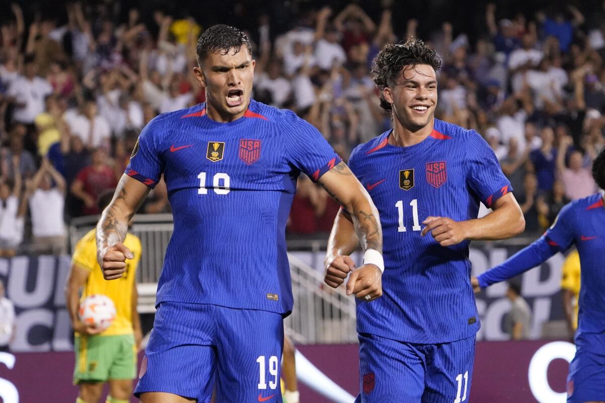 U.S. forward Brandon Vazquez, left, celebrates with teammate Cade Cowell after scoring in the 88th minute.