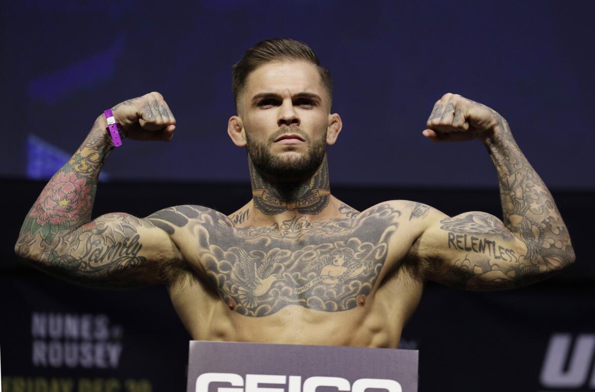 Cody Garbrandt poses for photographers during a Dec. 29 weigh-in for UFC 207 in Las Vegas.