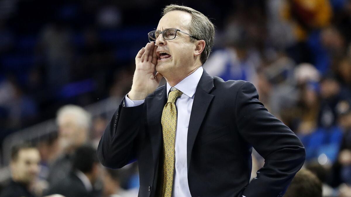 UCLA coach Murry Battow gives a play to his Bruins squad against Arizona State in the second half.