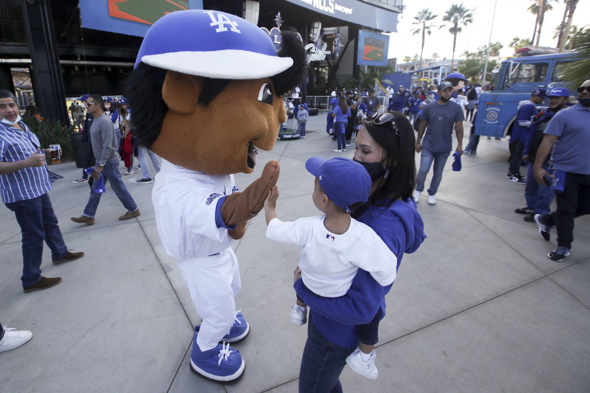  Dodgers bobblehead character greets fans.