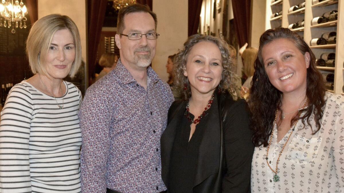 Eva Sippel, from left, Russell Freesland, Trena Pitchford and Gina Boulanger were among those who made last week's "Fall Wine Night" a success.
