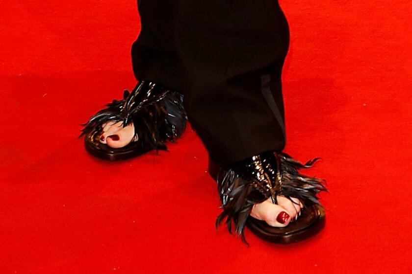 Tilda Swinton made an impression with her feathered footwear at the Berlinale.