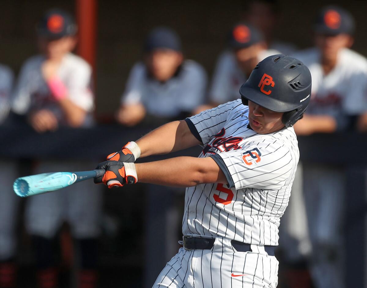 Pacifica Christian's Scout Escobedo (5) drives in the game winning, walk-off run to secure the win against San Bernardino.