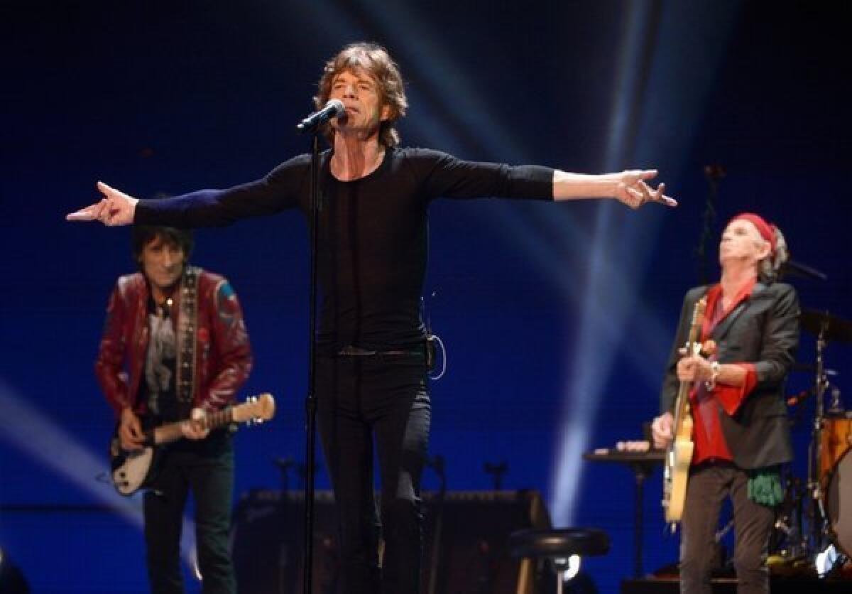 The Rolling Stones -- from left, Ron Wood, Mick Jagger and Keith Richards -- perform during the final U.S. stop on the group's 50 and Counting Tour in Washington.