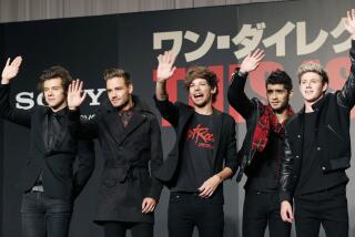 FILE- In this March 25, 2015 file photo, members of One Direction, from left, Harry Styles, Liam Payne, Louis Tomlinson, Zayn Malik and Niall Horan, wave during an event to promote their film "One Direction: This Is US," in Makuhari, near Tokyo. A British newspaper has reported Monday, Aug. 24, 2015, the band members would go separate ways after finishing a tour this autumn and promoting their fifth album. Publicist Simon Jones says he won’t comment on “speculation” that the group will take a hiatus starting in March. (AP Photo/Koji Sasahara, File)