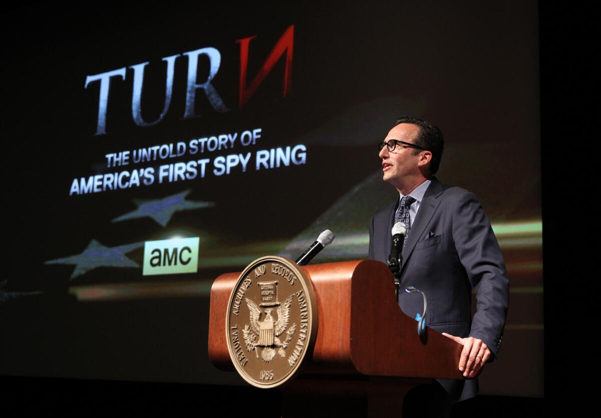 AMC President Charlie Collier makes a few remarks at the premiere of AMC's new series "Turn" at the National Archives on Monday in Washington, D.C.