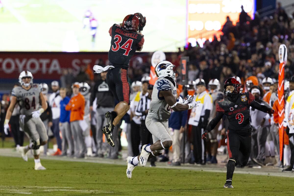 San Diego State capped a school-record 12-win season with a 38-24 victory over UTSA in the 2021 Frisco Bowl.