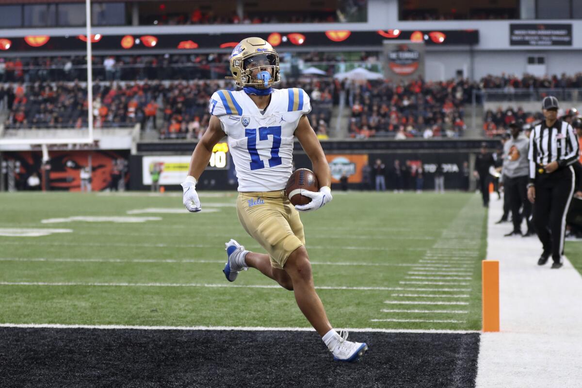 UCLA wide receiver Logan Loya scores a touchdown against Oregon State on Oct. 14.