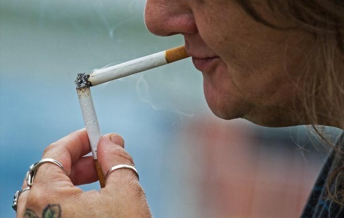 smoking two packs of cigarettes a day Qualitative Testing Revised Health Warnings for Cigarette Packages and on Cigarette Not a whole pack