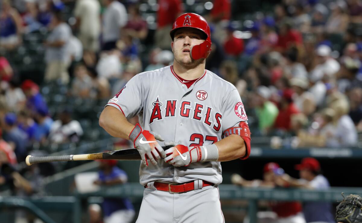 Angels slugger Mike Trout works an at-bat during the fourth inning of an 8-7 loss to the Texas Rangers on Monday.