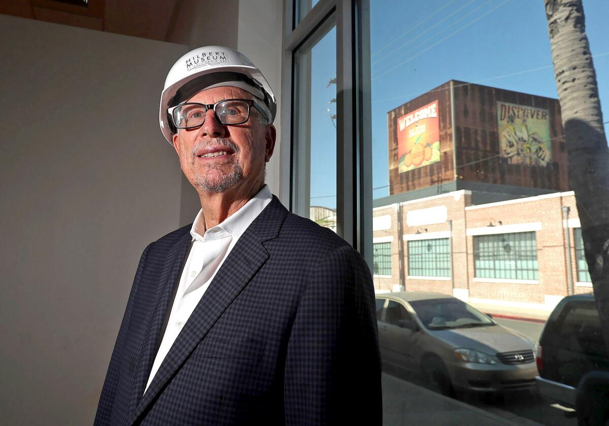 Founder and donor Mark Hilbert walks through one of the new showrooms at the Hilbert Museum of California Art.