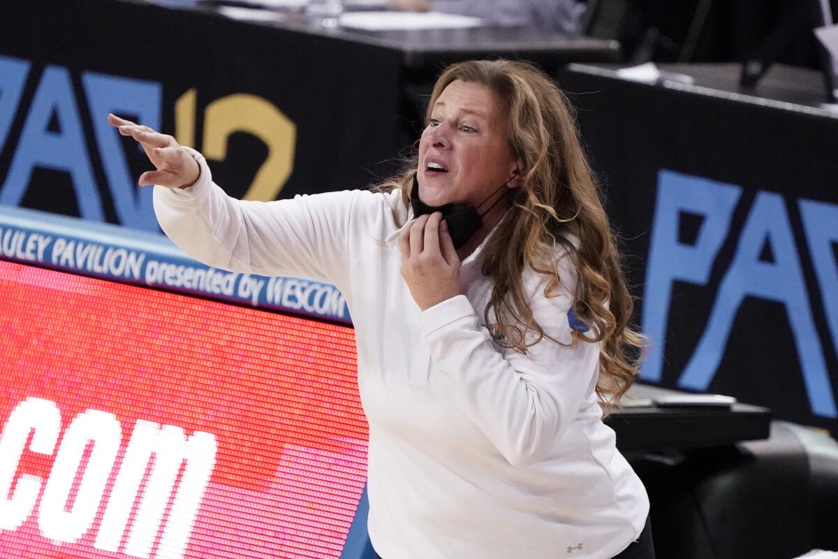 UCLA coach Cori Close instructs her players during a game against Stanford on Dec. 21.