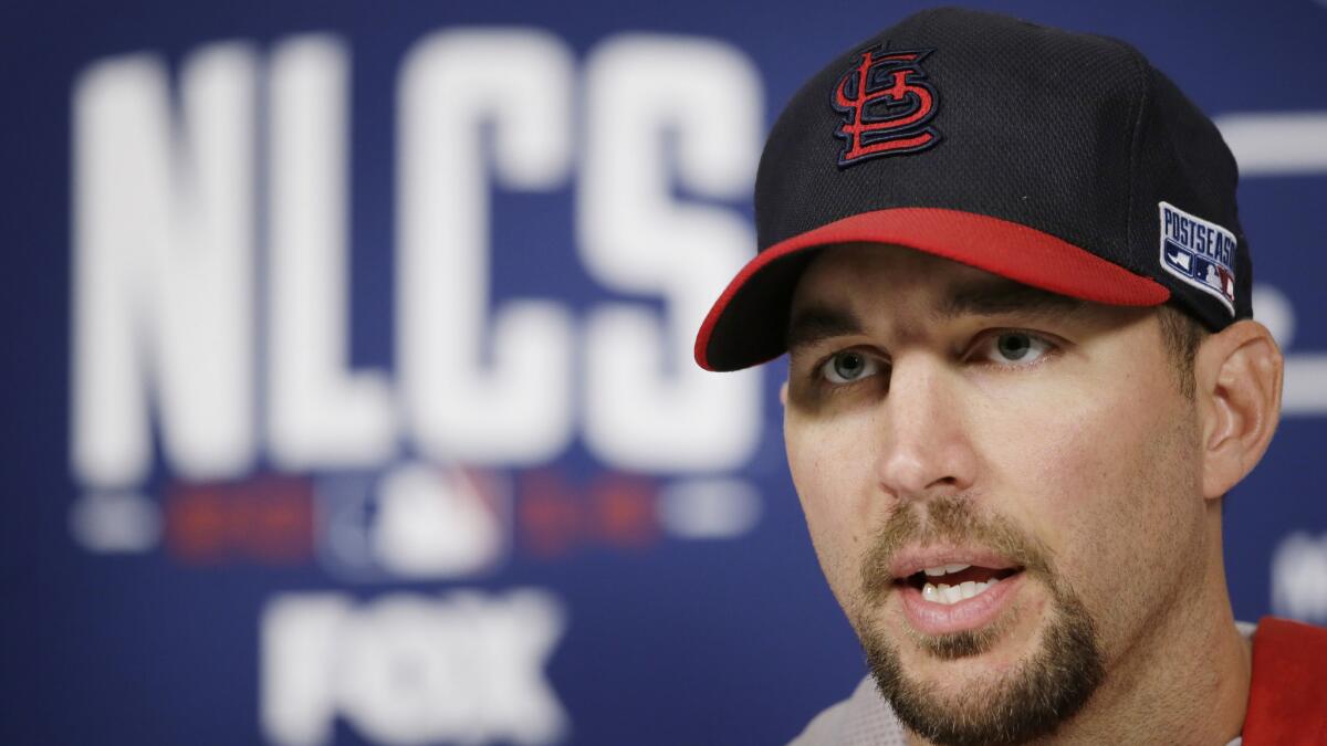 St. Louis Cardinals starting pitcher Adam Wainwright speaks during a news conference Friday.