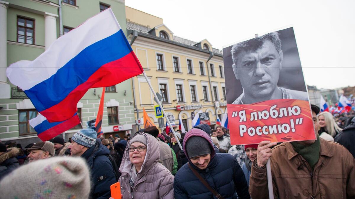 In Moscow, Russians march in memory of opposition leader Boris Nemtsov, who was gunned down two years ago on a bridge near the Kremlin.