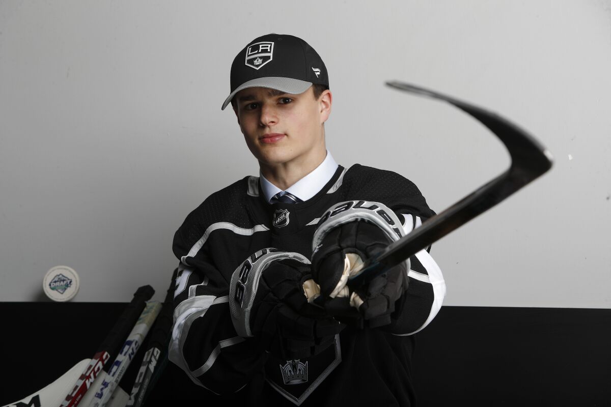 Alex Turcotte poses for a portrait after being selected fifth overall by the Kings in the 2019 NHL draft.