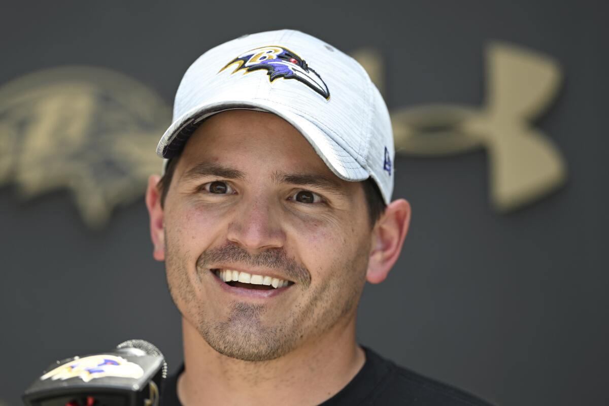 Baltimore Ravens defensive coordinator Mike Macdonald answers questions during a news conference after an NFL football practice, Wednesday, June 1, 2022, in Owings Mills, Md. (AP Photo/Gail Burton)