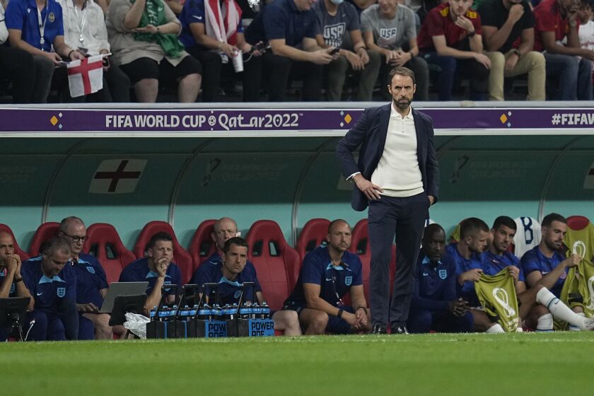 England's head coach Gareth Southgate watches play during the World Cup group B soccer match between England and The United States, at the Al Bayt Stadium in Al Khor , Qatar, Friday, Nov. 25, 2022. (AP Photo/Abbie Parr)