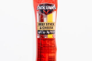 LOS ANGELES, CA, DECEMBER 26, 2024: Store bought grocery items that contain red dye #3, including Jack Links beef stick and cheese, are photographed at the Los Angeles Times on December 26, 2024. High doses of red dye #3 were found to cause cancer in lab animals decades ago. A federal law known as the Delaney Clause says no compound shown to cause cancer in animals or humans can be in the food supply. The FDA acknowledged the cancer studies decades ago and used the findings to deny a request to approve the dye's use in cosmetics, however, red #3 was already being used in food, and for some reason its authorization has not yet been revoked. (Christina House / Los Angeles Times)
