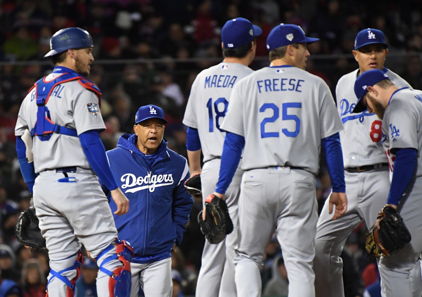 Dodgers manager Dave Roberts takes out relief pitcher Kenta Maeda in the seventh inning.