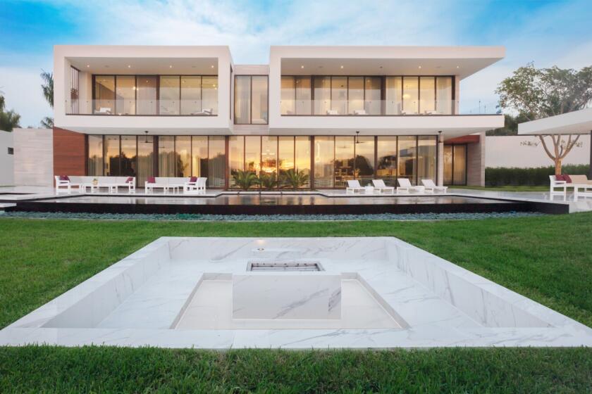 Built in 2020, the 9,300-square-foot mansion includes seven bedrooms, 10 bathrooms, a gym, movie theater, swimming pool and basketball court.