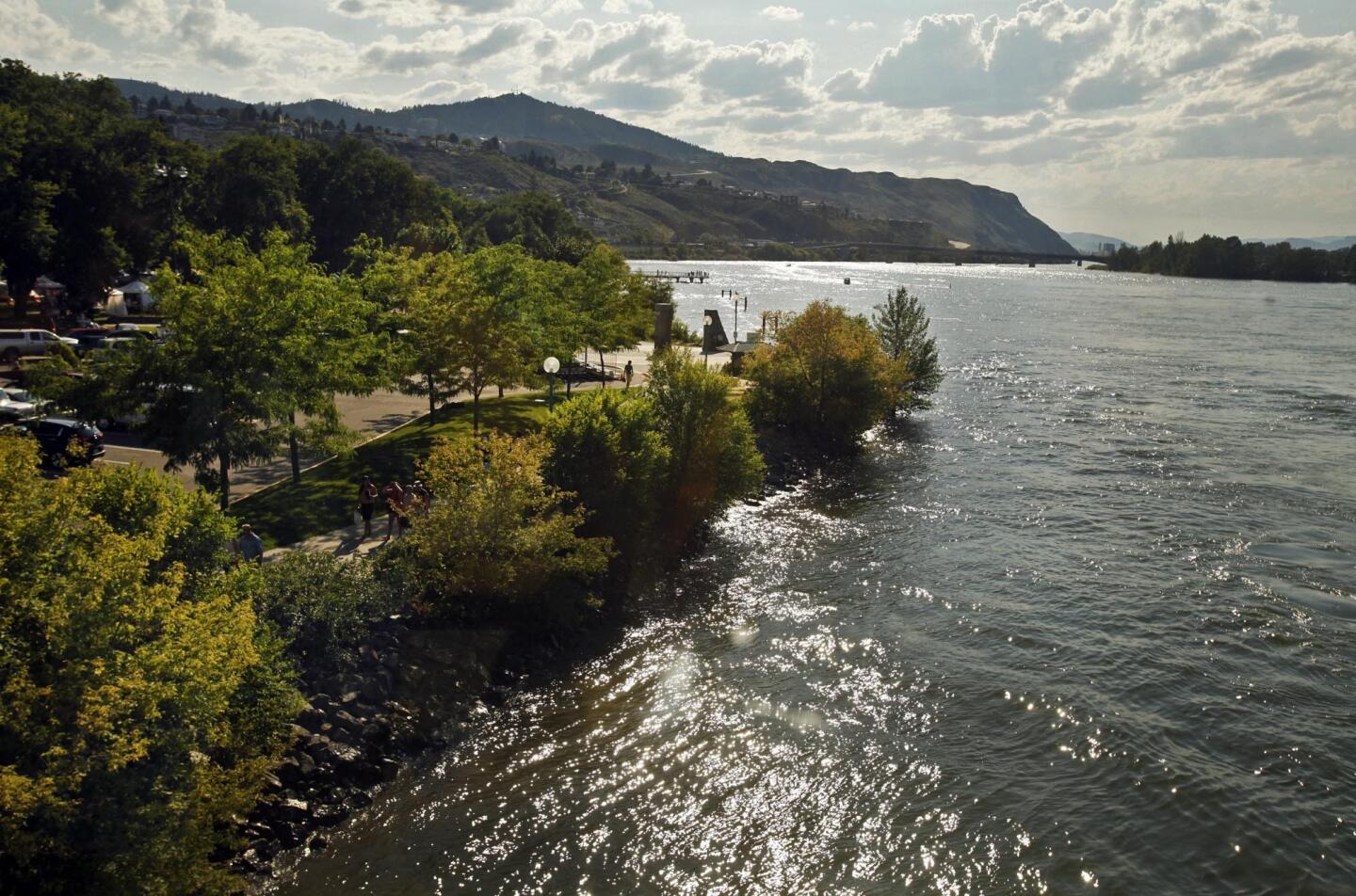 Kamloops, British Columbia, seen here from a train at the edge of town, was born along the Thompson River in the 1890s as a railroad town with about 500 occupants. Nowadays the population is about 90,000. If you take a train through the Rockies, you'll see Kamloops.