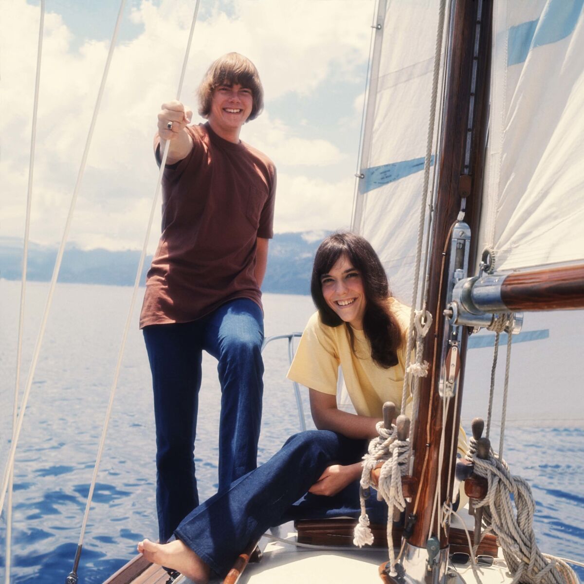 Richard and Karen Carpenter on a sailboat in Lake Tahoe.