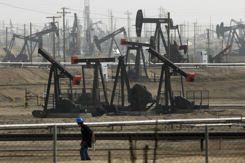 FILE - This Jan. 16, 2015, file photo shows pumpjacks operating at the Kern River Oil Field in Bakersfield, Calif. California Gov. Gavin Newsom on Saturday, Oct. 12, 2019, signed a law intended to counter Trump administration plans to increase oil and gas production on protected public land. (AP Photo/Jae C. Hong, File)