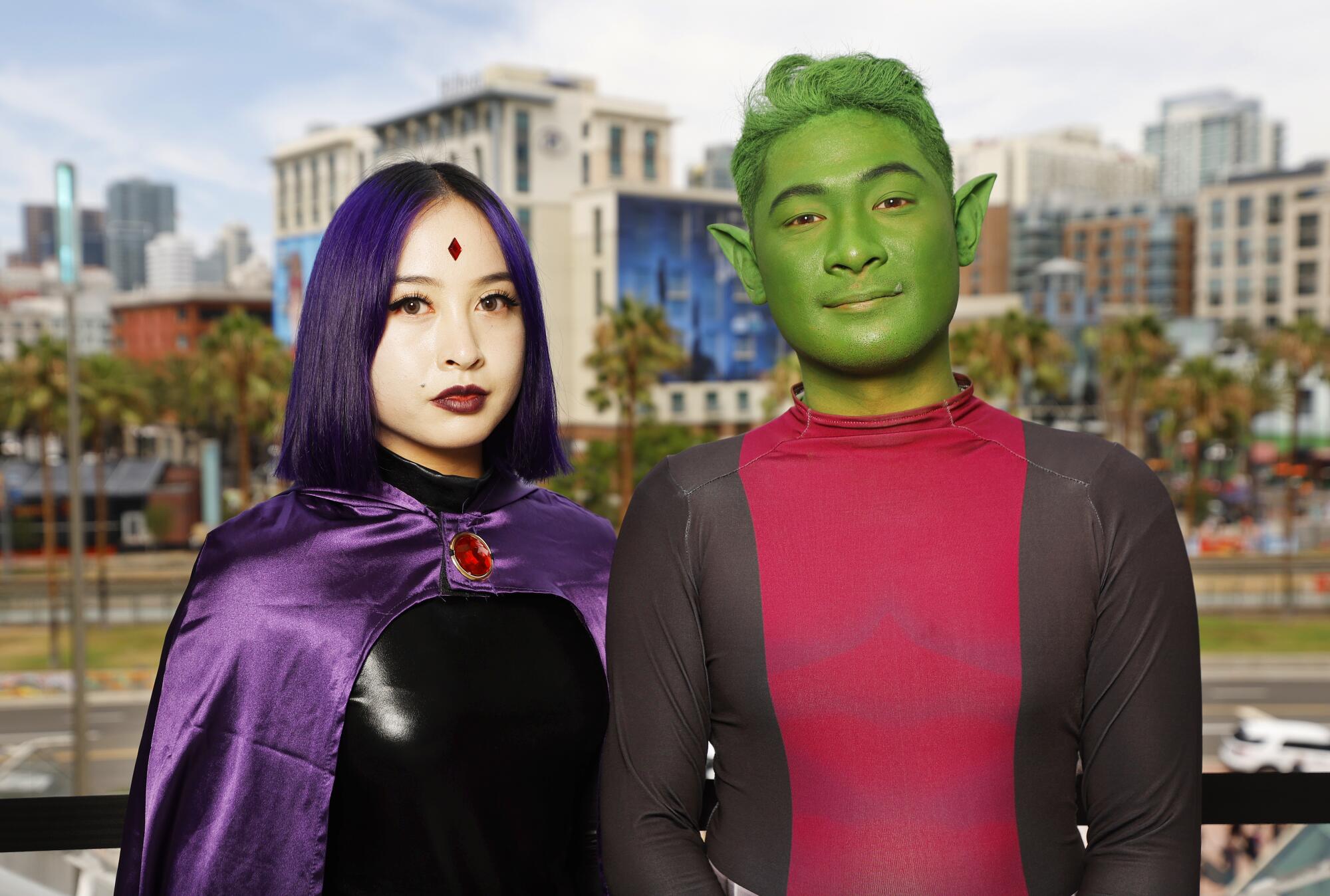 Amy Sayasne dressed as Raven and Randy Song as Beast Boy at Comic-Con.