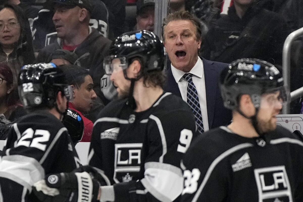 Kings coach Jim Hiller instructs his players during a game against the Calgary Flames on Thursday.