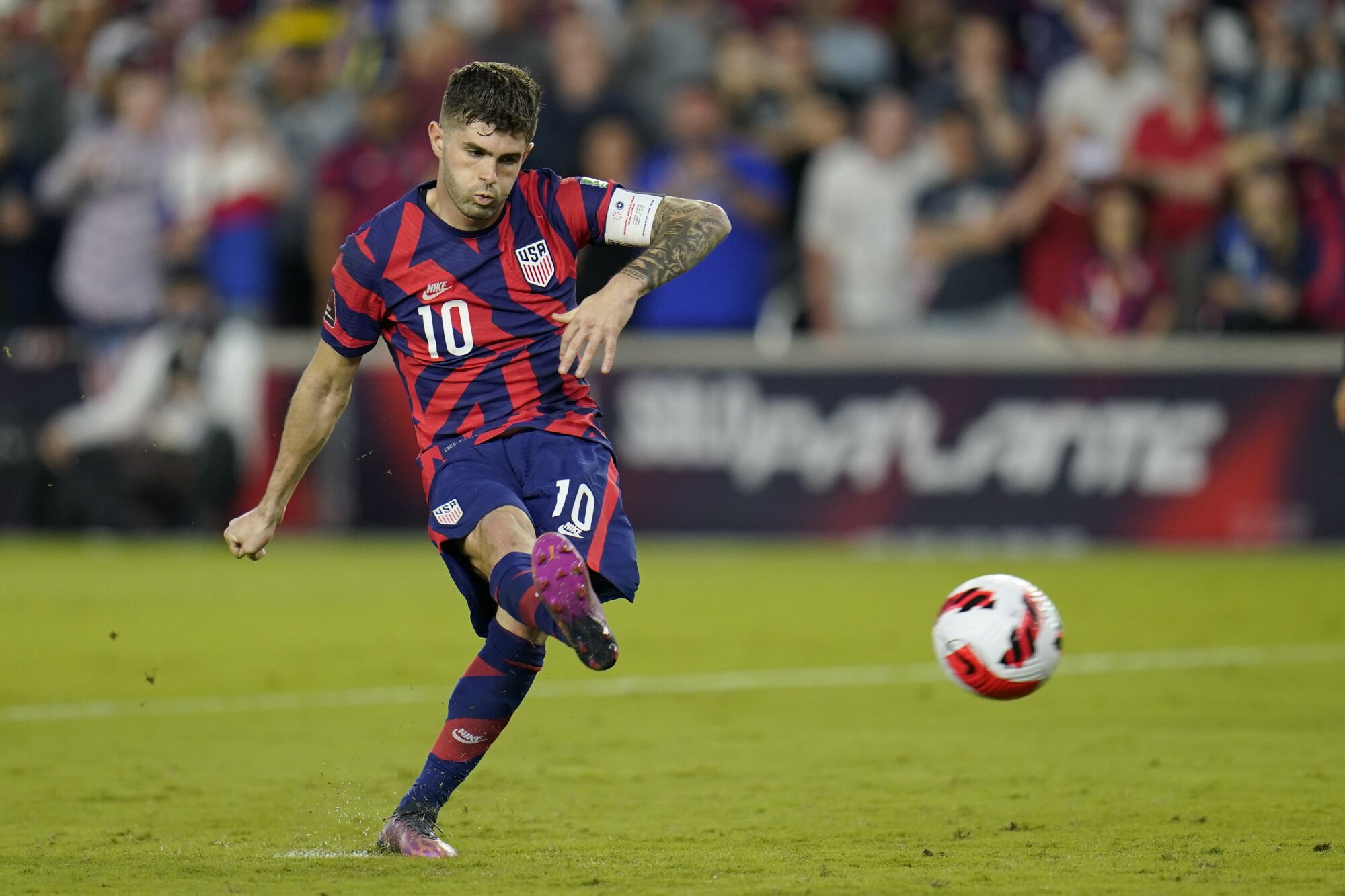 Christian Pulisic scores a goal on a penalty kick during a World Cup qualifier against Panama in March.
