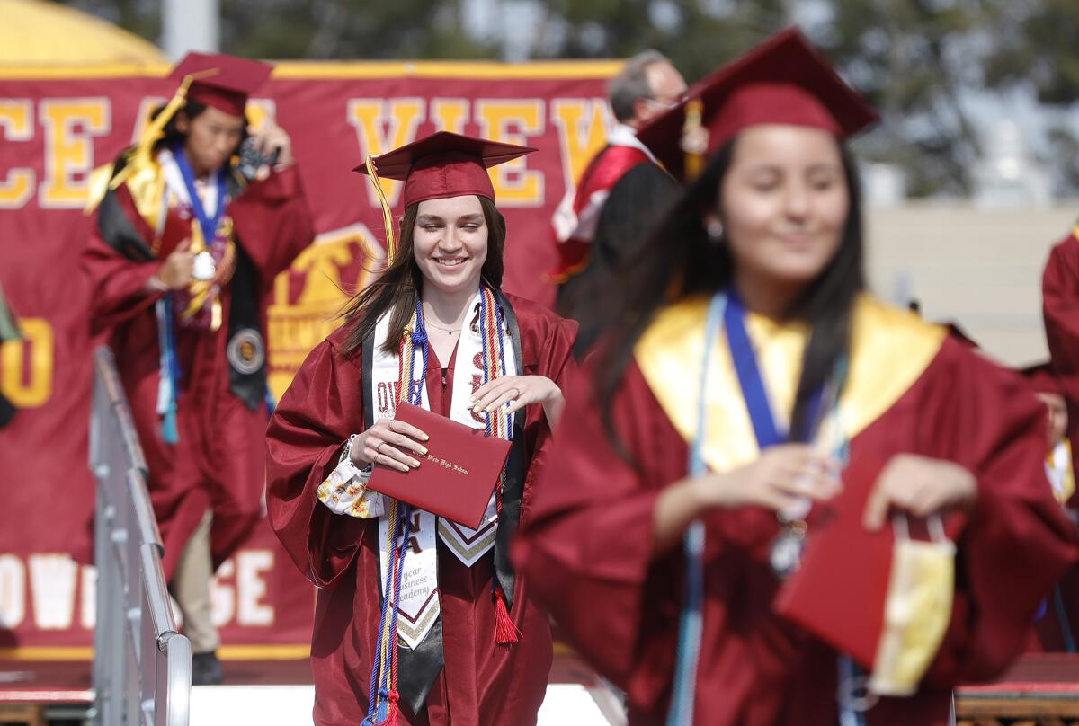 Cyenna Nielsen is all smiles after accepting her diploma during the Ocean View High graduation ceremony on Wednesday.
