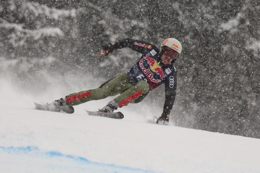 FILE - Forerunner Marcel Hirscher speeds down the course during an alpine ski, men's World Cup downhill, in Kitzbuehel, Austria, on Jan. 21, 2022. Eight-time overall World Cup champion Hirscher is planning to return to ski racing next season after five years in retirement. And he’s going to compete for the Netherlands — his mother’s country — instead of his native Austria. The Austrian winter sports federation announced Wednesday, April 24, 2024, that it had released the 35-year-old Hirscher and endorsed his nation change. (AP Photo/Marco Trovati, File)