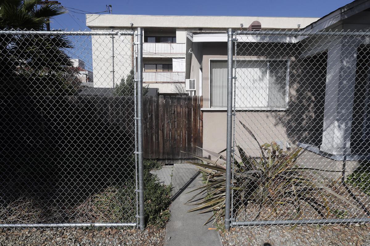 This is a boarded-up property near the Garfield campus of Glendale Community College.