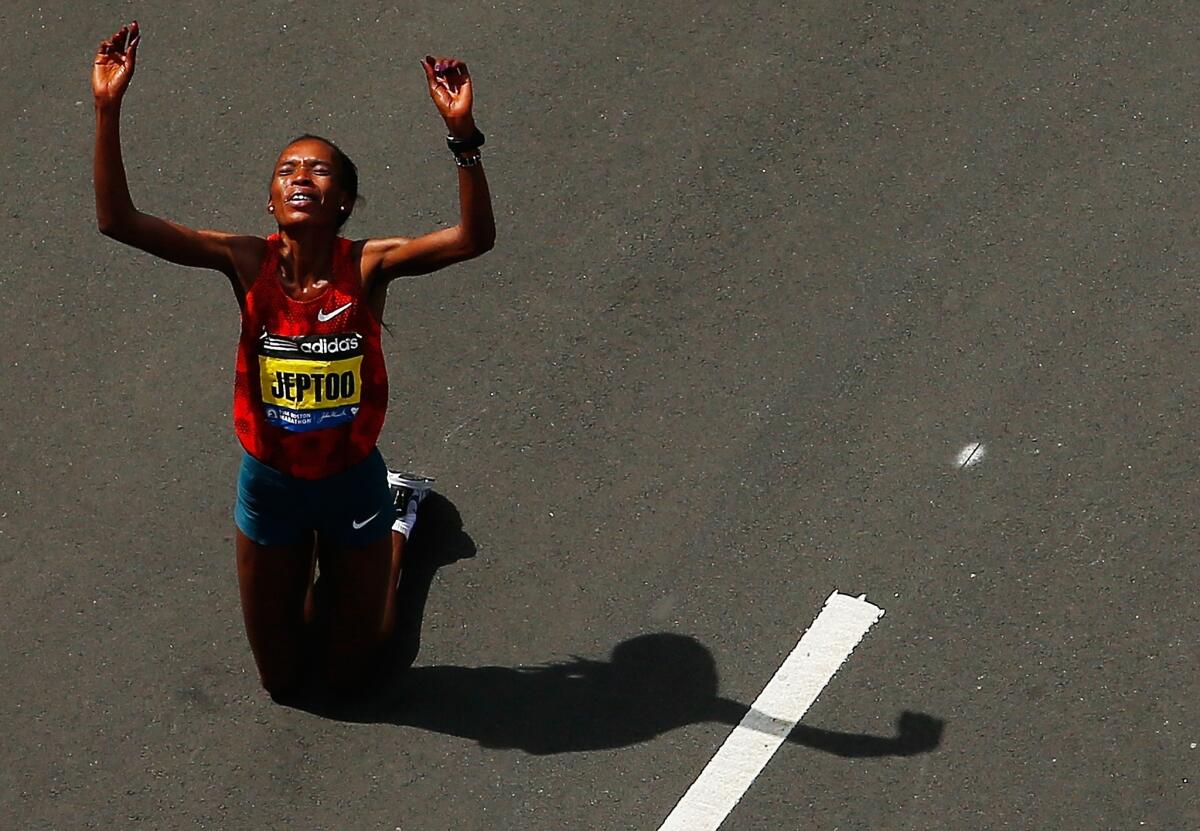 Kenya's Rita Jeptoo, shown after winning the women's division of the 2014 Boston Marathon in April, faces a lengthy ban after testing positive for EPO.