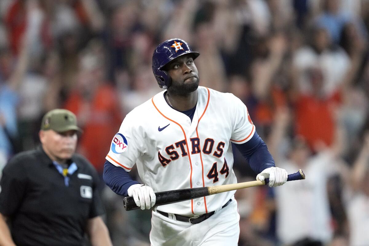 Yordan Alvarez signs home run baseball for fan who caught it