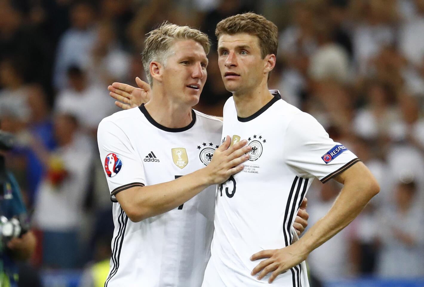 Football Soccer - Germany v France - EURO 2016 - Semi Final - Stade Velodrome, Marseille, France - 7/7/16 Germany's Bastian Schweinsteiger and Thomas Muller react the end of the match REUTERS/Michael Dalder Livepic ** Usable by SD ONLY **