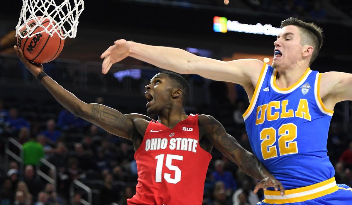 Ohio State's Kam Williams drives to the basket against UCLA's TJ Leaf during the CBS Sports Classic at T-Mobile Arena on Saturday in Las Vegas.