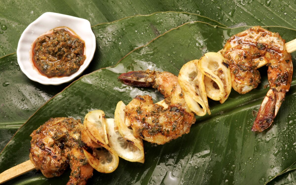 Grilled shrimp skewers with charmoula