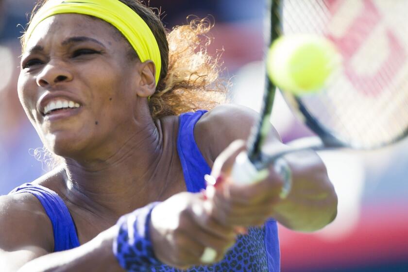 Serena Williams returns to Lucie Safarova of the Czech Republic during a third round match at the Rogers Cup in Montreal. Williams defeated Safarova, 7-5, 6-4.