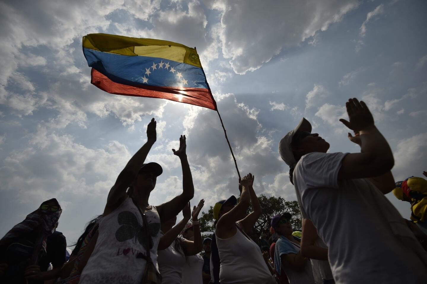 People attend "Venezuela Aid Live" concert, organized to raise money for the Venezuelan relief effort at Tienditas International Bridge in Cucuta, Colombia, on February 22, 2019. - Venezuela's political tug-of-war morphs into a battle of the bands on Friday, with dueling government and opposition pop concerts ahead of a weekend showdown over the entry of badly needed food and medical aid. (Photo by Luis ROBAYO / AFP)LUIS ROBAYO/AFP/Getty Images ** OUTS - ELSENT, FPG, CM - OUTS * NM, PH, VA if sourced by CT, LA or MoD **