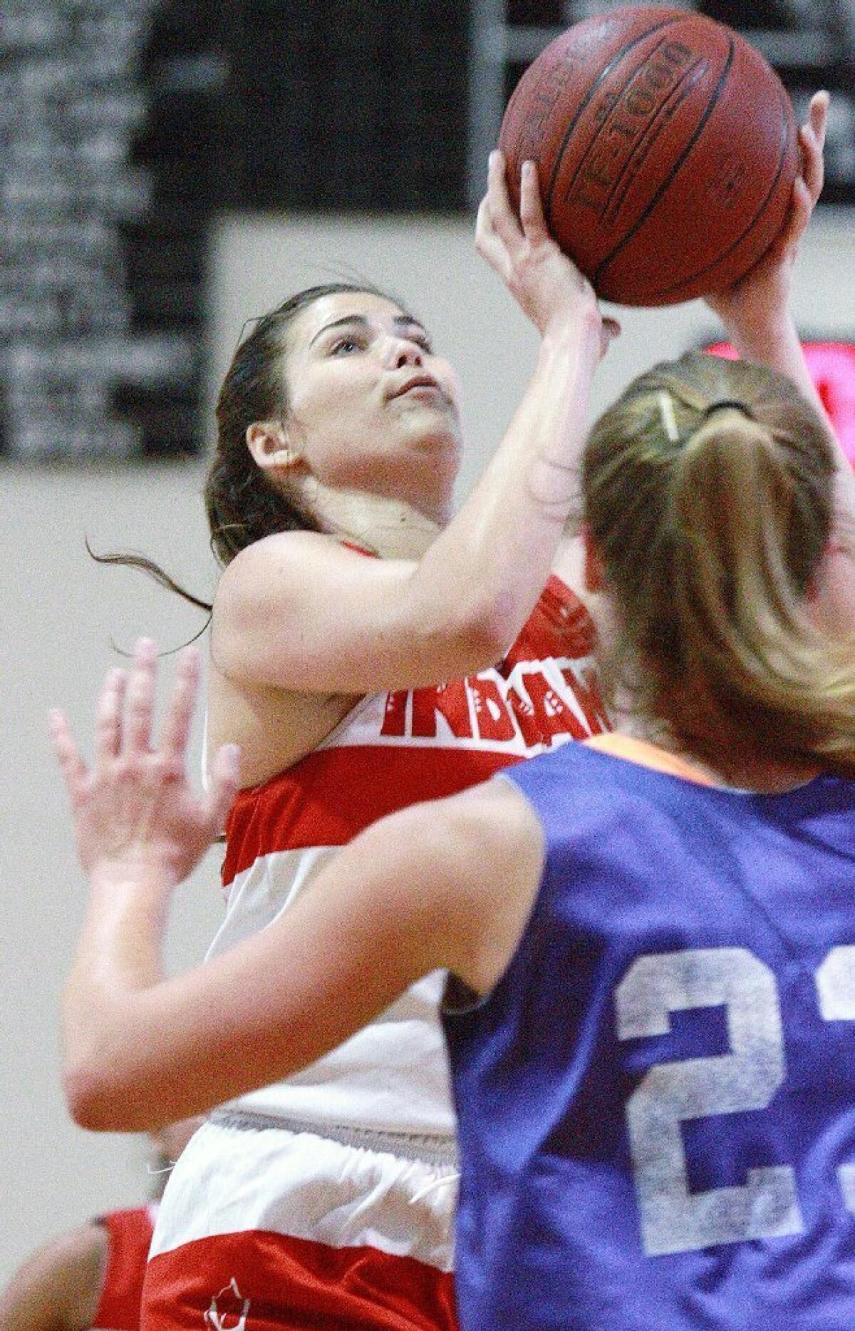 Burroughs' Caitlyn Pentland and the Indians lost to Valencia in summer action on Tuesday.