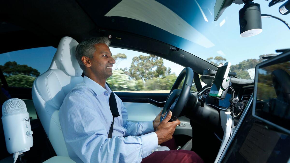 Tesloop co-founder and CEO Rahul Sonnad drives one of his company's cars around the San Diego area.