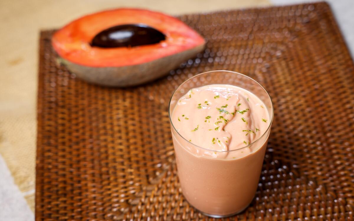 A Mamey Sapote shake from Chef Jordan Kahn, next to a cut mamey fruit