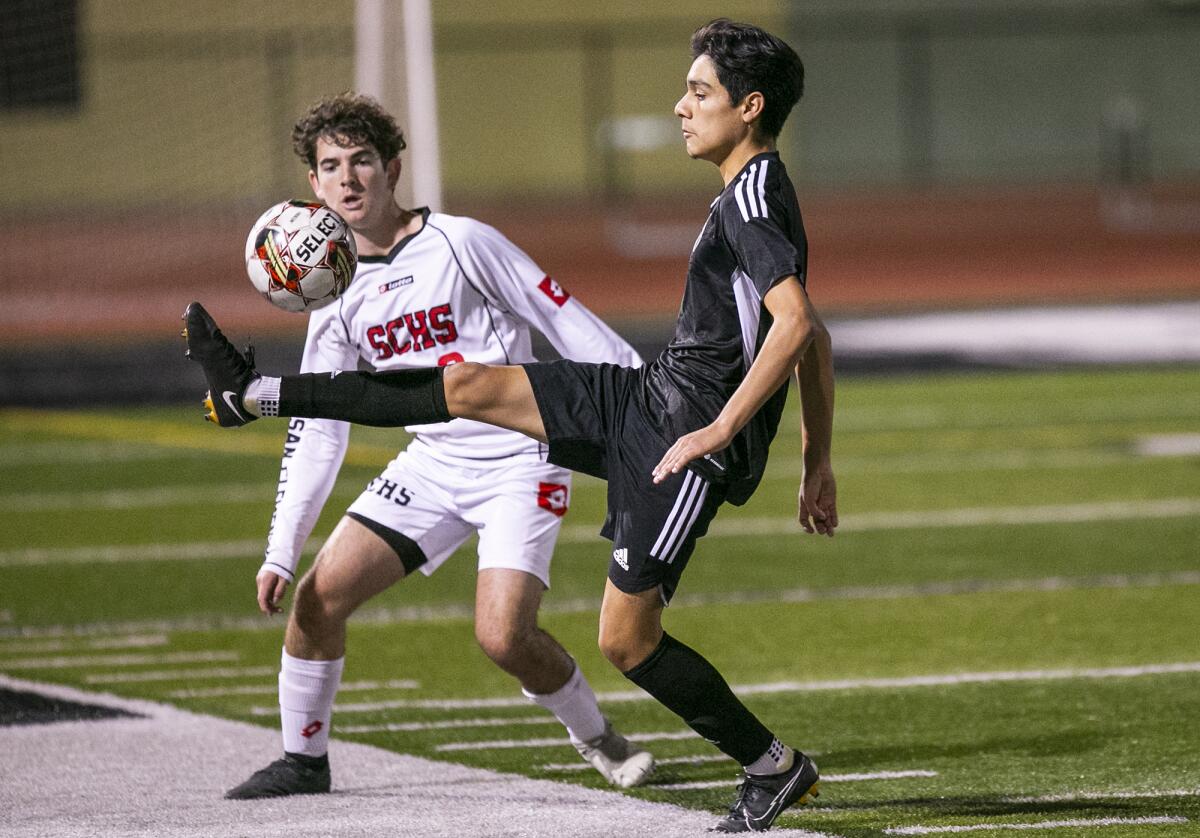 Costa Mesa's Miguel Reyes, seen against San Clemente in 2022, scores a goal.