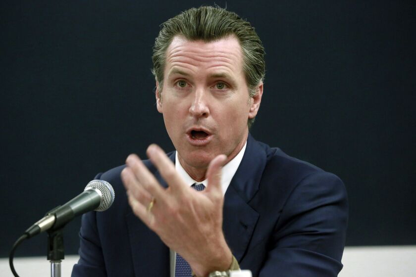 California Lt. Gov. Gavin Newsom, pictured at a forum in April, will announce a new ballot initiative to strengthen the state's gun laws on Thursday.