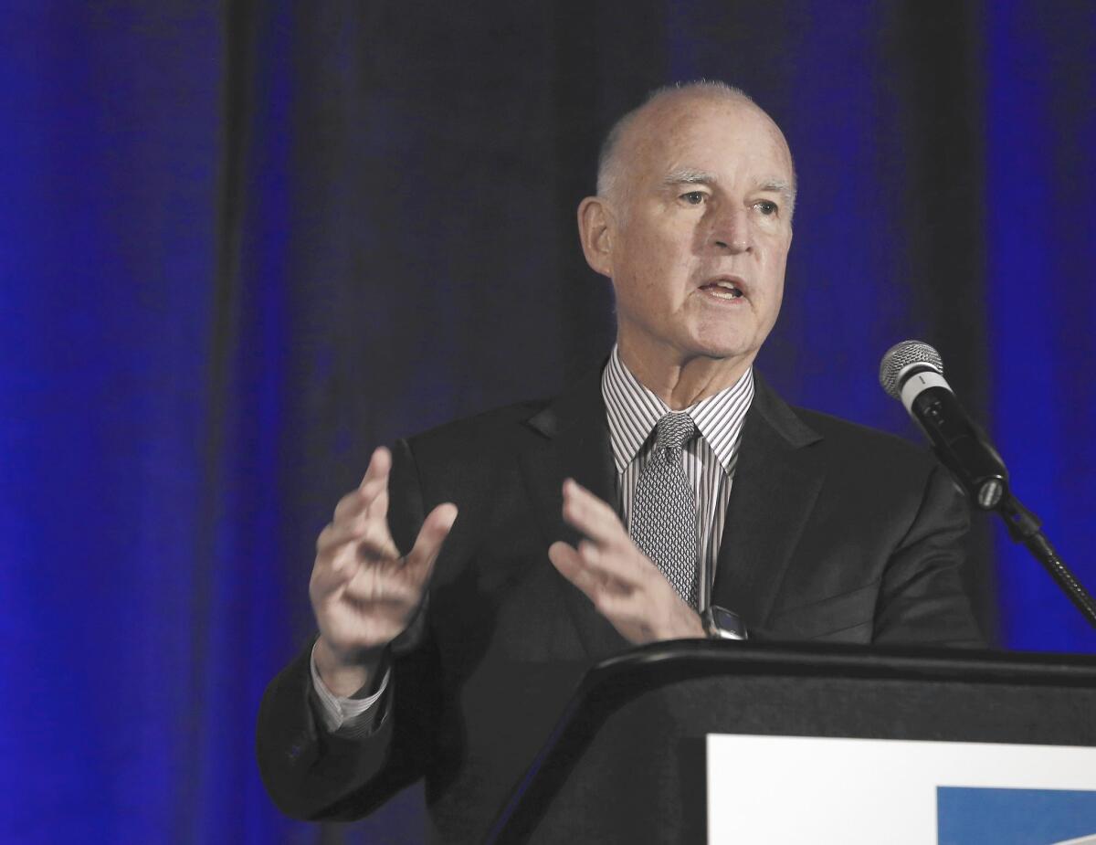 Gov. Jerry Brown has been sued over a law he signed that allows public financing of campaigns.