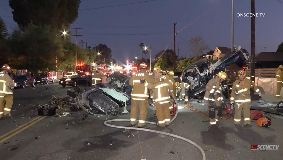 Los Angeles firefighters work the scene of a multi-vehicle crash.