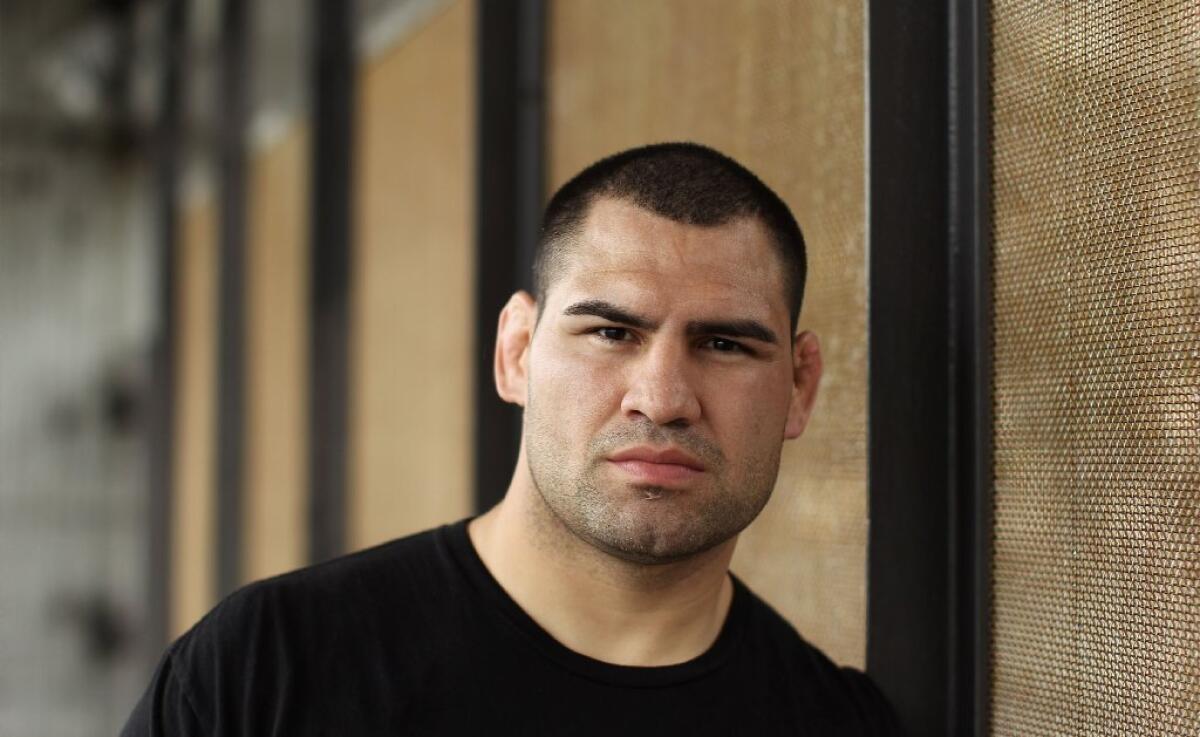 Cain Velasquez, above, and Junior Dos Santos split their first two fights. The two meet again on Oct. 19 in Houston.